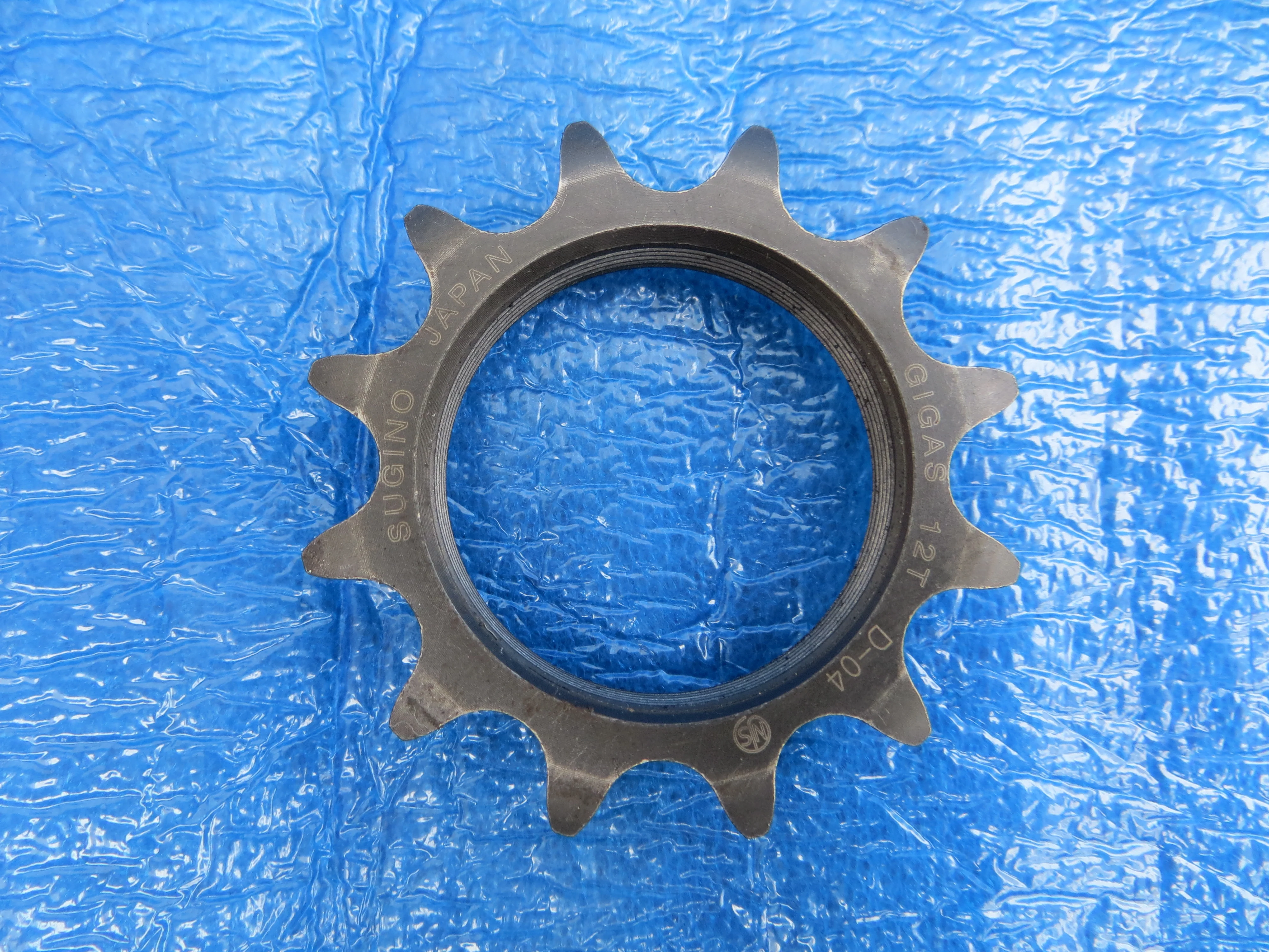Sugino Gigas 12t 1/8” Track Cog NJS (26043009)