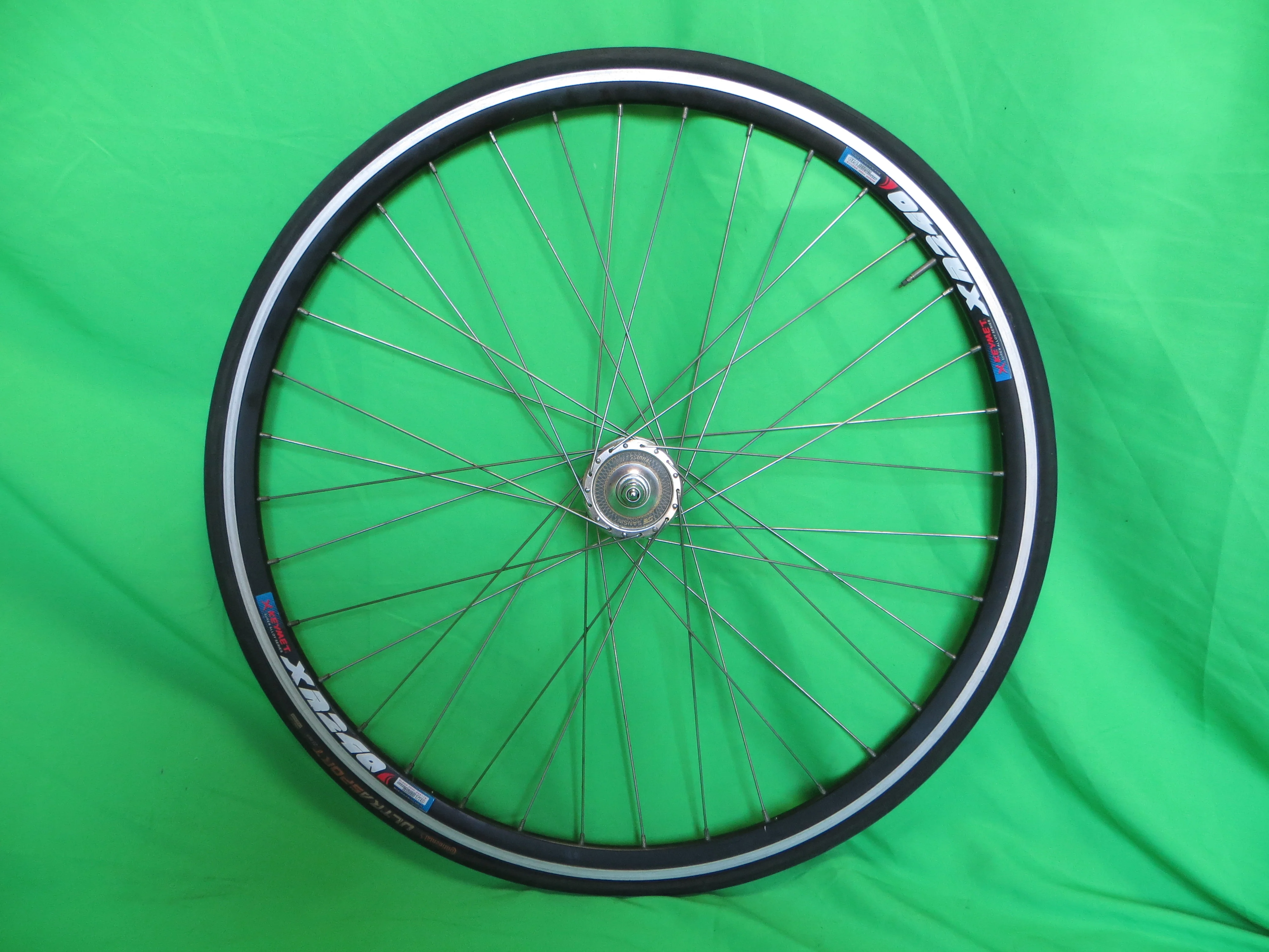 X Keyment XR240 36H 700c Clincher Rim, Sansin Professional 100mm/9mm Front NJS Hub, Continental Tire (24120101)